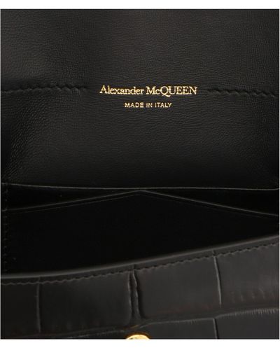 Alexander McQueen Clutch in pelle stampa cocco - Nero