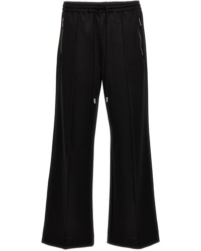 JW Anderson Pantalone 'Bootcut track' - Nero