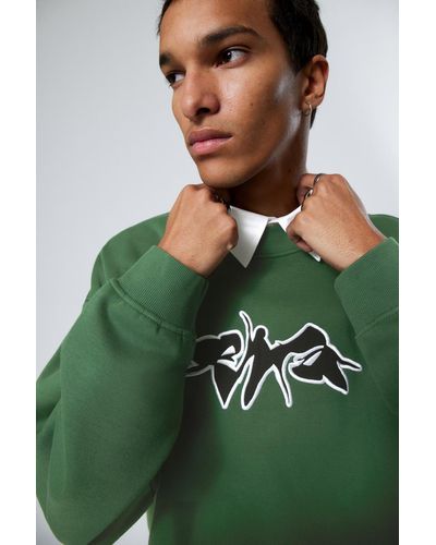 Weekday Kastiges Sweatshirt mit Grafikprint - Grün