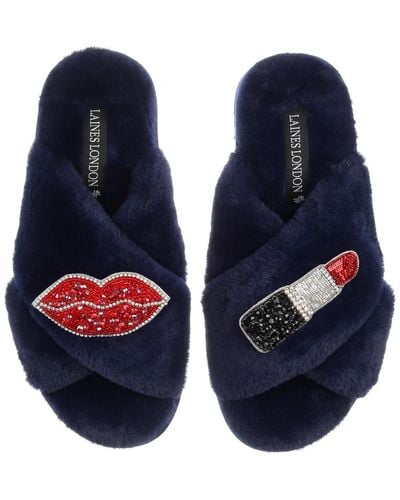https://cdna.lystit.com/400/500/tr/photos/wolfandbadger/c270903f/laines-london-Blue-Classic-Laines-Slippers-With-Red-Silver-Pucker-Up-Brooches.jpeg