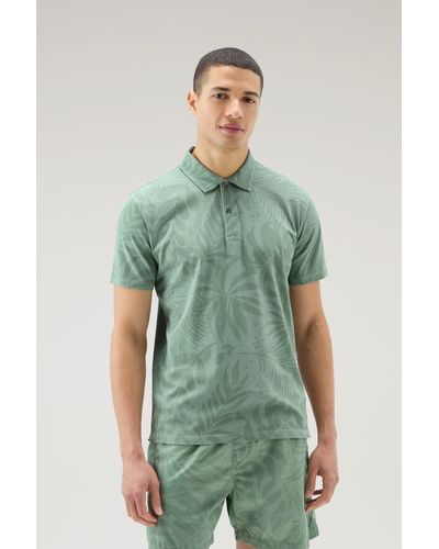 Woolrich Garment-dyed Polo Shirt In Stretch Cotton With A Tropical Print - Green