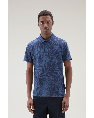 Woolrich Garment-dyed Polo Shirt In Stretch Cotton With A Tropical Print - Blue