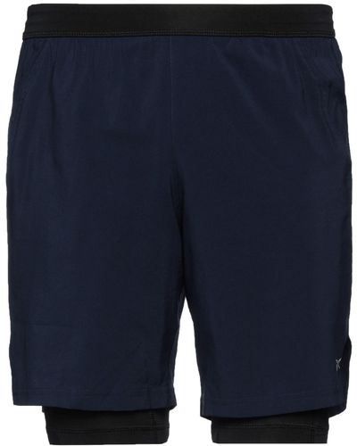 Reebok Shorts & Bermuda Shorts - Blue