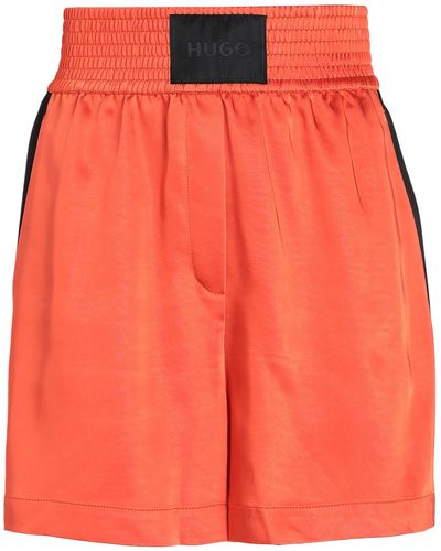 HUGO Shorts & Bermuda Shorts - Orange