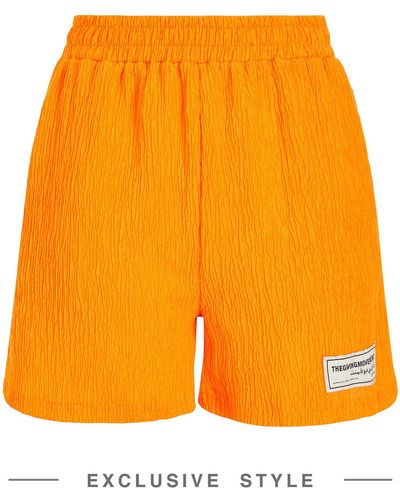 THE GIVING MOVEMENT x YOOX Shorts & Bermuda Shorts - Orange