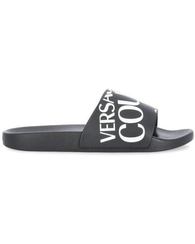 Versace Jeans Couture Sandalias slip-on con logo estampado - Negro