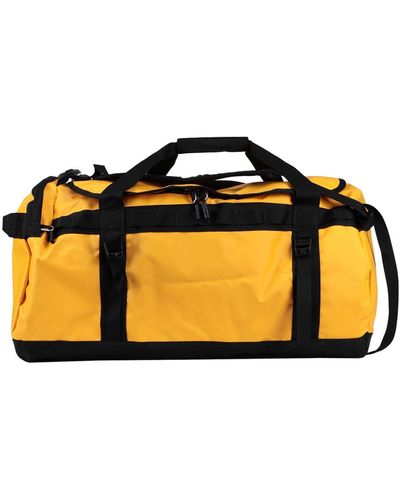 The North Face Duffel Bags - Yellow