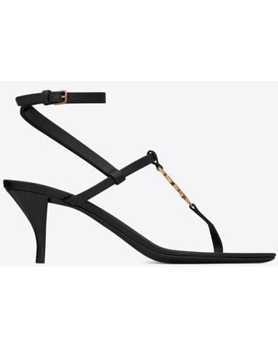 Saint Laurent Cassandra sandalen aus glattleder mit goldenem monogramm schwarz