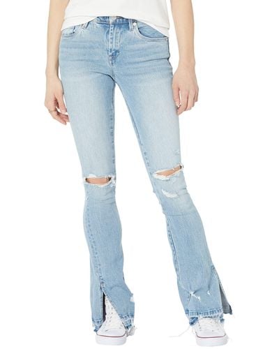 Blank NYC Hoyt Mini Boot Denim Jeans With Ripped Knees And Side Slit Released Hem In Blue - White