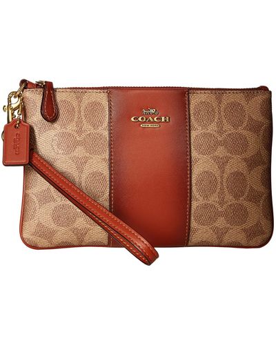 COACH Ladies Tan Leather Coated Canvas Pouch - Brown