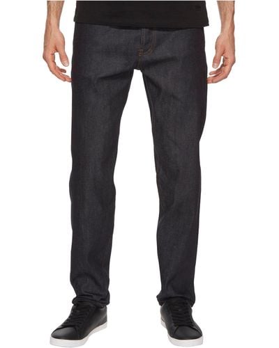 The Unbranded Brand Relaxed Tapered Fit In 11oz Indigo Stretch Selvedge - Black