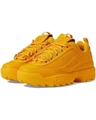 mustard yellow fila shoes