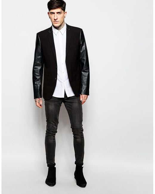 Blazer with top leather sleeves