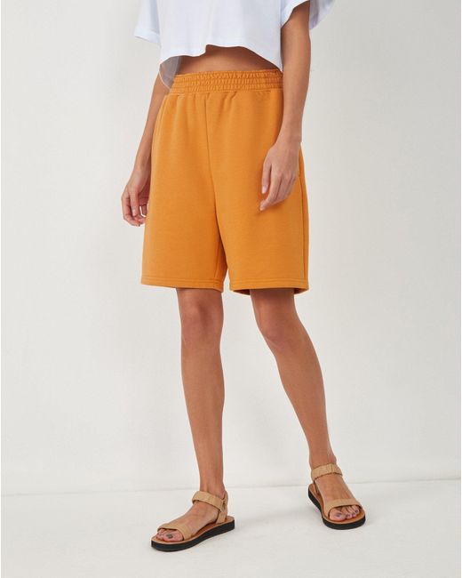 orange jogger shorts