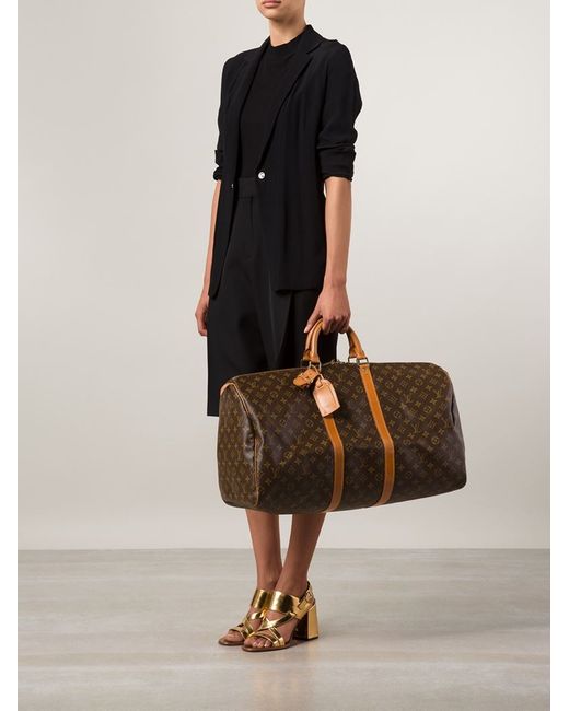 Keepall cloth travel bag Louis Vuitton Brown in Cloth - 34488815