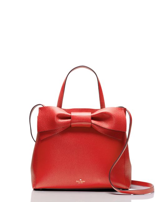 red kate spade purse with bow