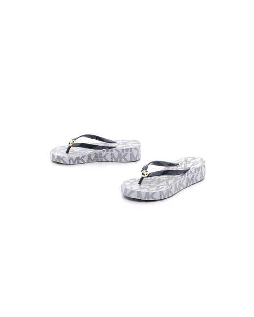 MICHAEL Michael Kors Bedford Wedge Flip Flops Navy in Blue Lyst
