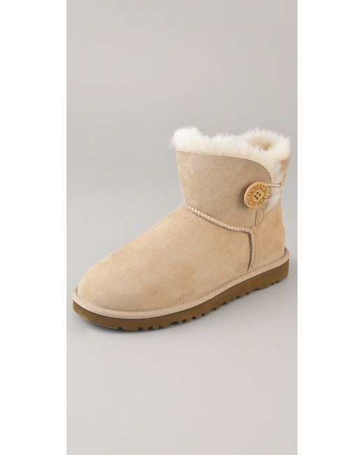 UGG Mini Bailey Button Booties in Natural | Lyst Canada