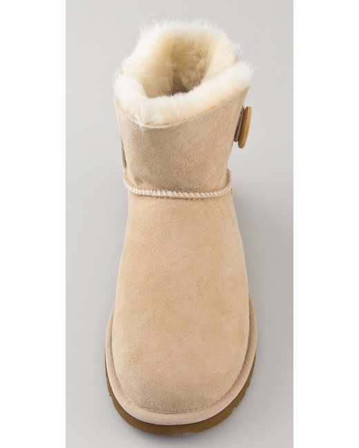 UGG Mini Bailey Button Booties in Natural | Lyst