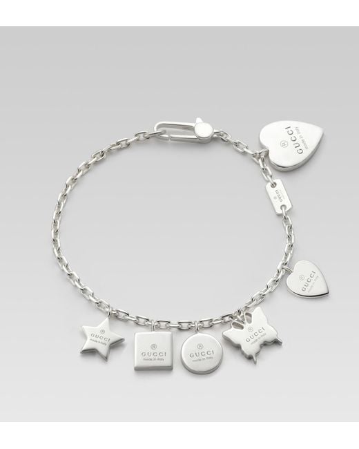 Gucci Bracelet with Gucci Trademark Engraved Charms in Metallic | Lyst