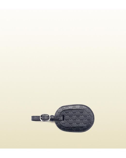 Luggage hot sale tag gucci
