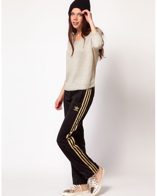 adidas Originals Retro Luxury track pants in brown with monogram print   ASOS