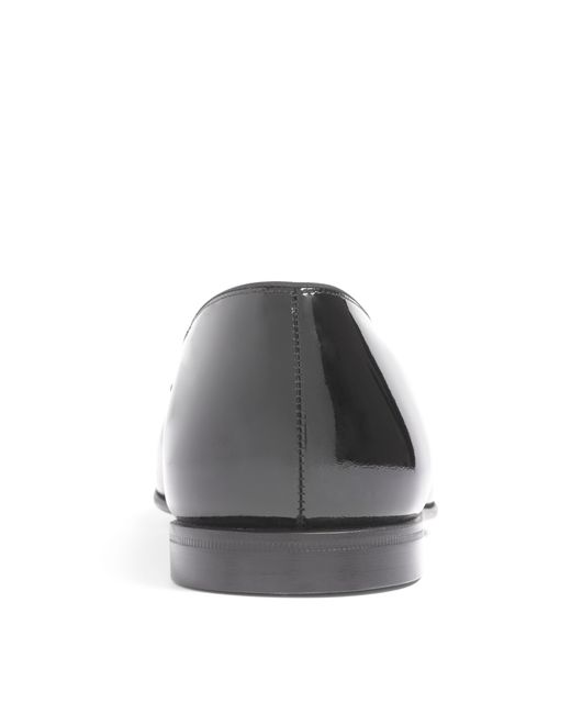 black patent loafers with bow