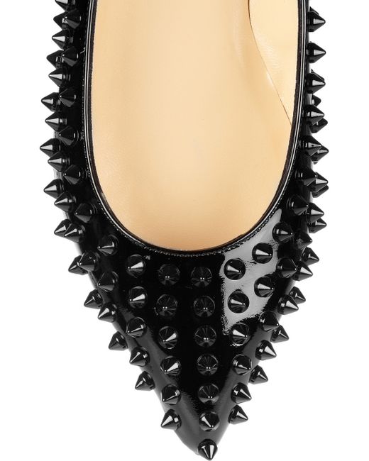 Louboutin flat hotsell spikes black