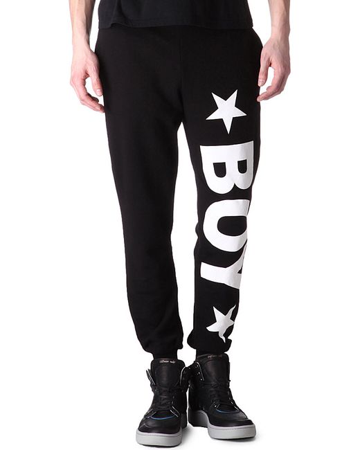 Boys white jogging bottoms Product Description These youth soccer training pants help your child warm up without.