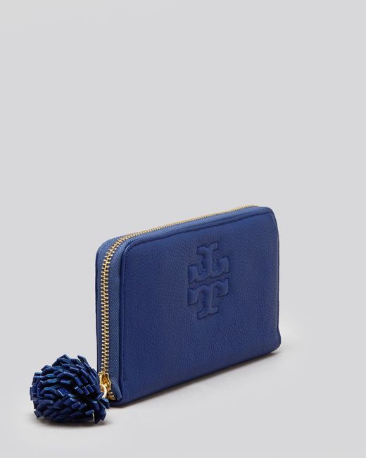 Tory Burch Wallet Thea Zip Continental with Pom Pom in Blue | Lyst