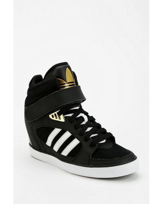 Urban Outfitters Adidas Amberlight Hidden Wedge Hightop Sneaker in Black |  Lyst