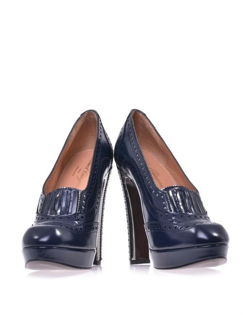 Navy heeled brogues shop