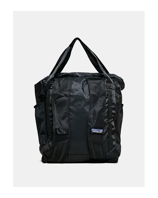 Patagonia lightweight travel tote pack 22l black deals