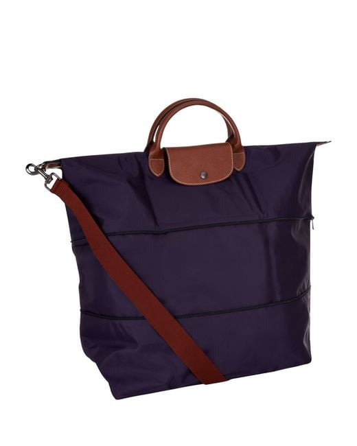 Longchamp Le Pliage Expandable Travel Bag in Blue Lyst UK