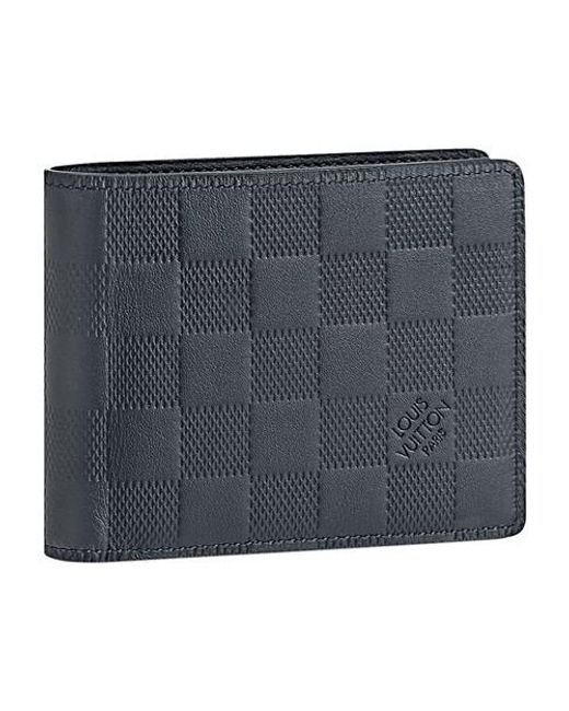 Louis Vuitton Men Multiple Wallet in embossed Damier Infini leather.