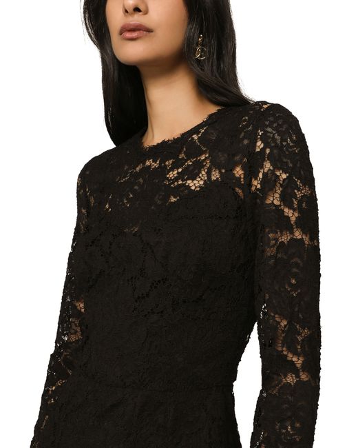 Robe à manches longues en dentelle extensible Dolce & Gabbana en coloris Black