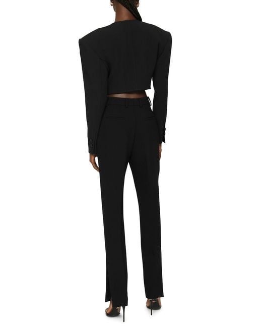 Pantalon en laine avec fentes à l'ourlet Dolce & Gabbana en coloris Black