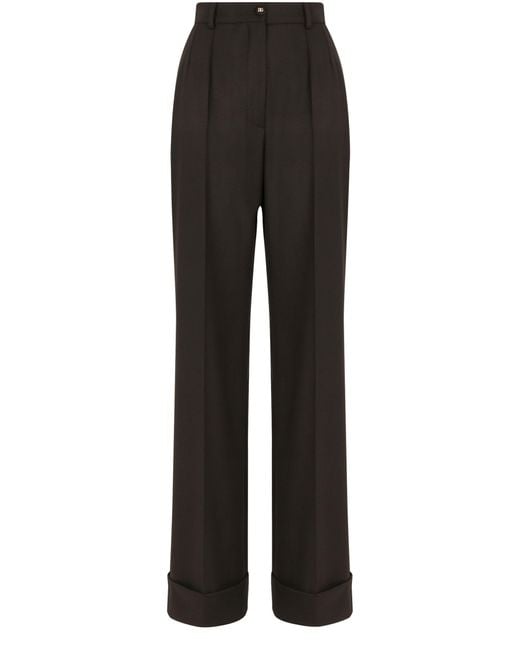 Pantalon palazzo en laine à revers Dolce & Gabbana en coloris Black