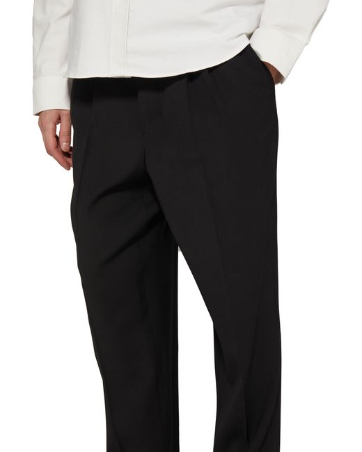 AMI Black Carrot Fit Trousers for men