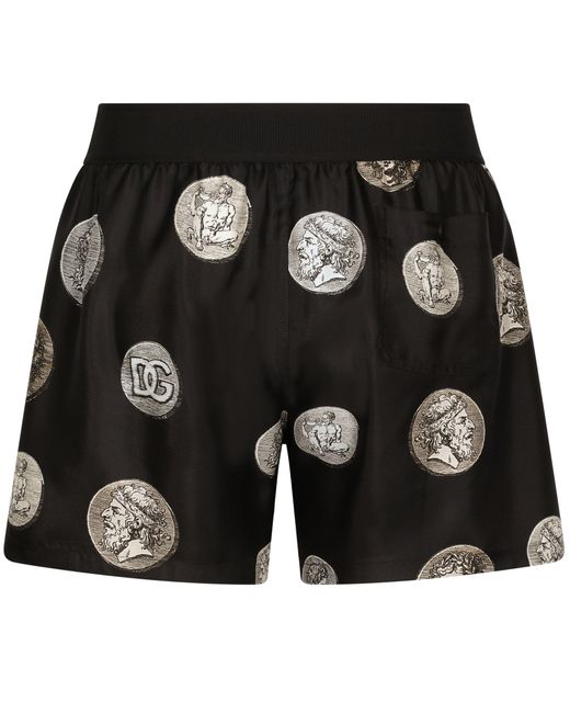 Dolce & Gabbana Black Silk Shorts With Coin Print for men