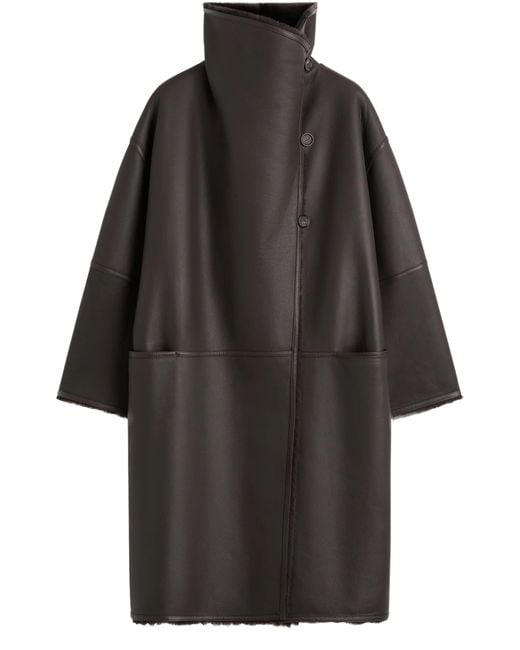 Manteau Portefeuille En Peau Lainée Totême  en coloris Black