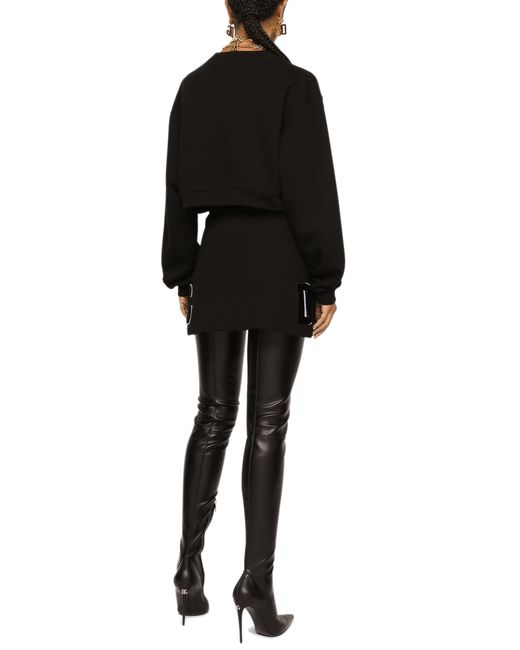 Dolce & Gabbana Black Jersey Miniskirt With Logo Patch