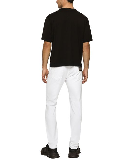 Jean skinny en tissu stretch blanc Dolce & Gabbana pour homme en coloris White