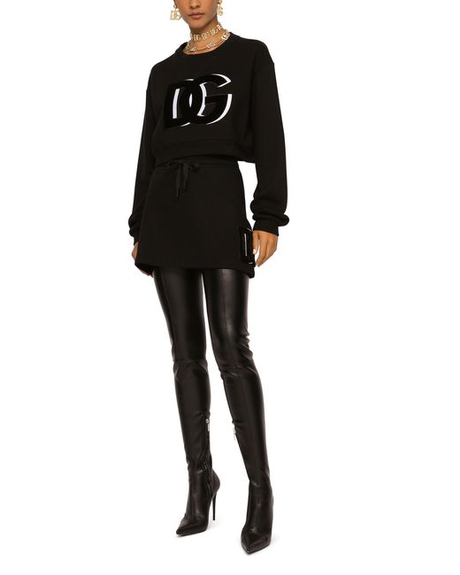 Dolce & Gabbana Black Jersey Miniskirt With Logo Patch