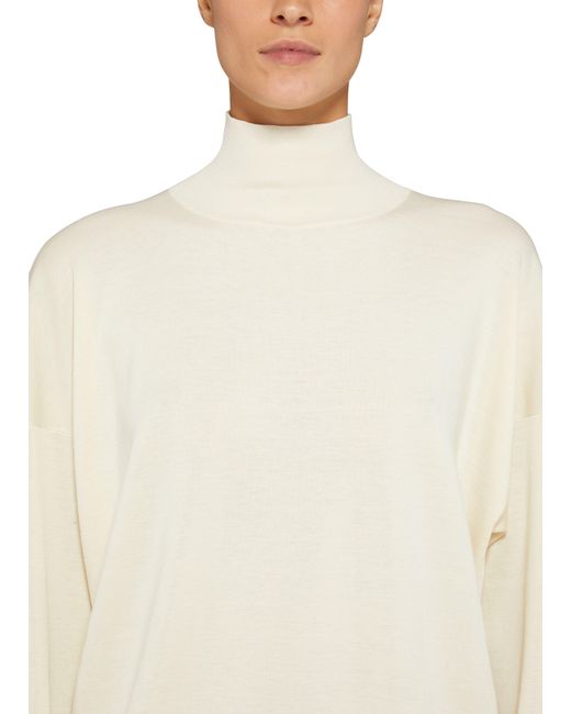 The Row White Turtleneck Sweater