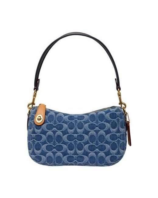 COACH Washed Denim Signature Swinger Bag in b4_indigo_midnight_navy