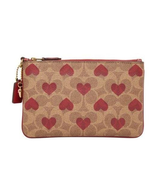 COACH Pink Small Wristlet In Heart Print Signature Canvas