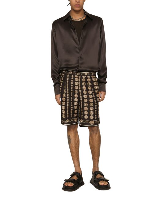 Dolce & Gabbana Black Silk Bermuda Shorts With Coin Print for men