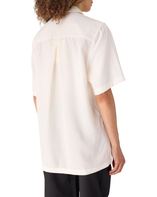 Polo Fluide Totême en coloris White