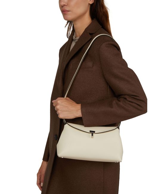 Totême  Black Leder Clutch-Tasche T-Lock